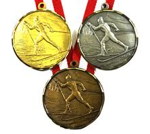 Medaille Langlauf "DS010" inkl. Band: Messingmedaille Ø32mm mit geprägtem Relief-Motiv "LANGLAUFEN" inkl. Band